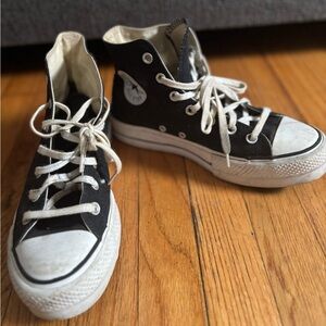 Converse women’s Black and White High-Top Sneakers